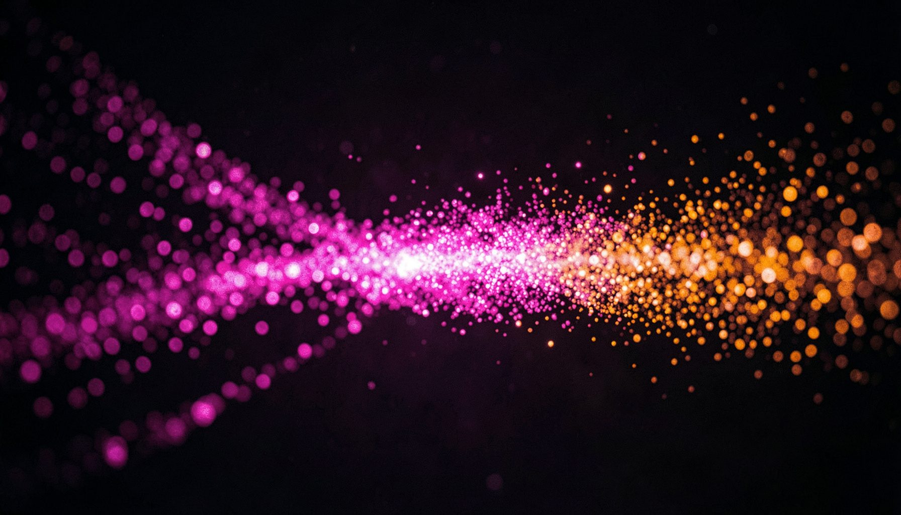 Glowing particle trail effect in vibrant magenta and orange against a dark background, cinematic wide shot